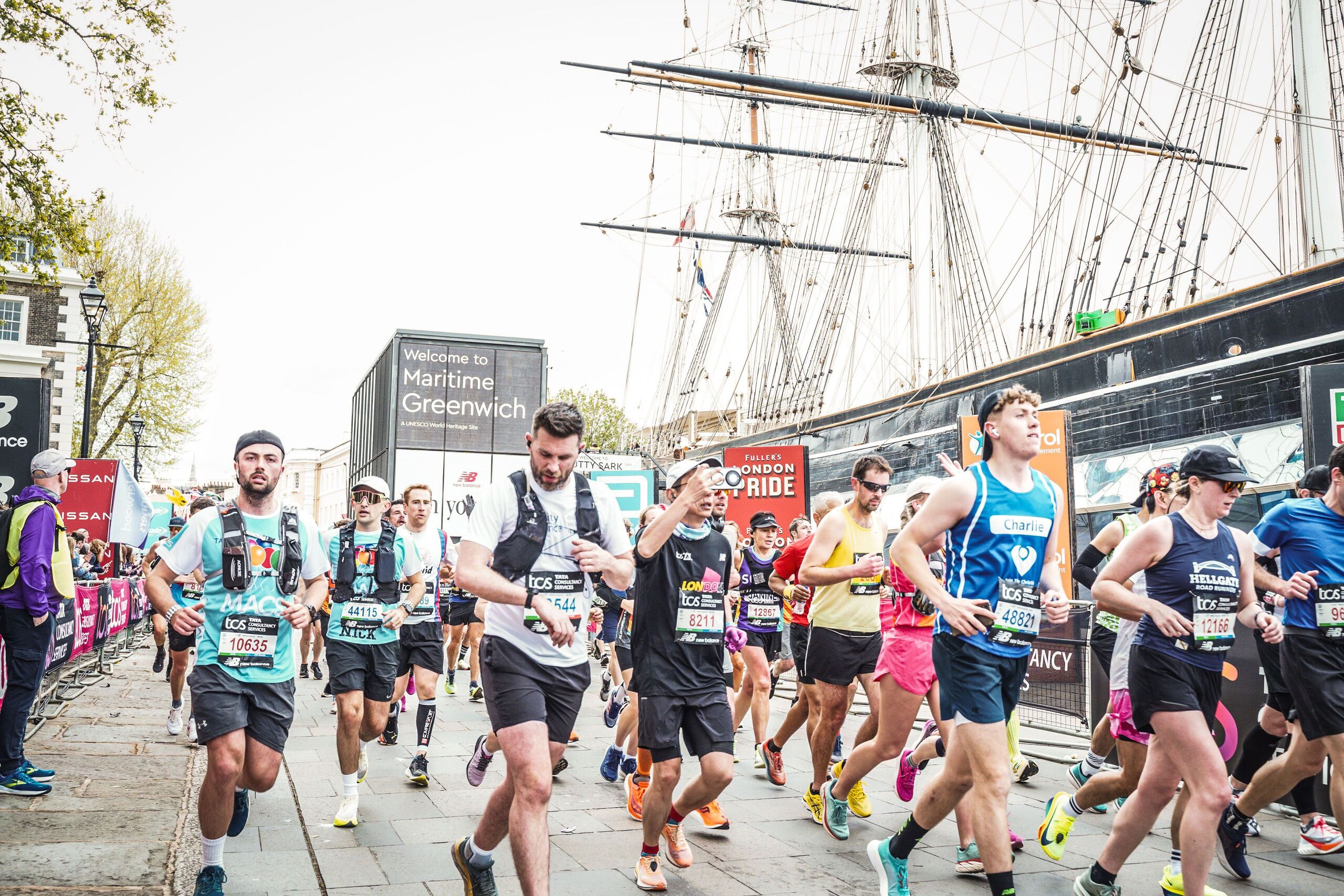 Tom Cox pictured taking part in the marathon
