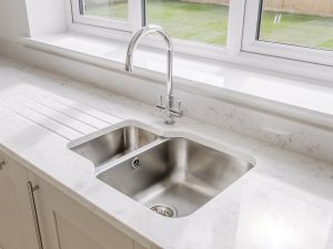 Quartz worktop and undermounted sink