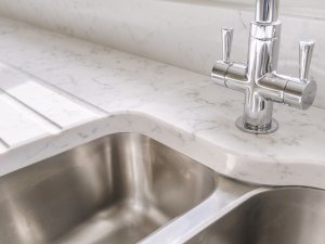 Quartz worktop and undermounted sink