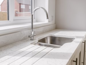 Quartz worktop and undermounted sink