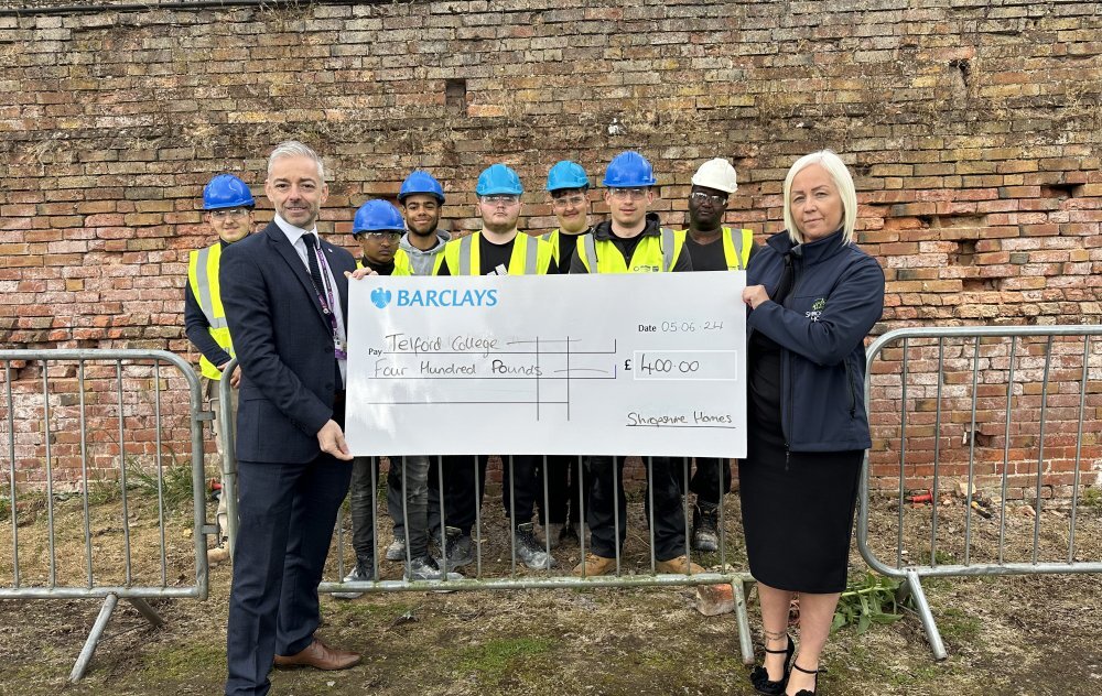 Handing over the donation to Telford College