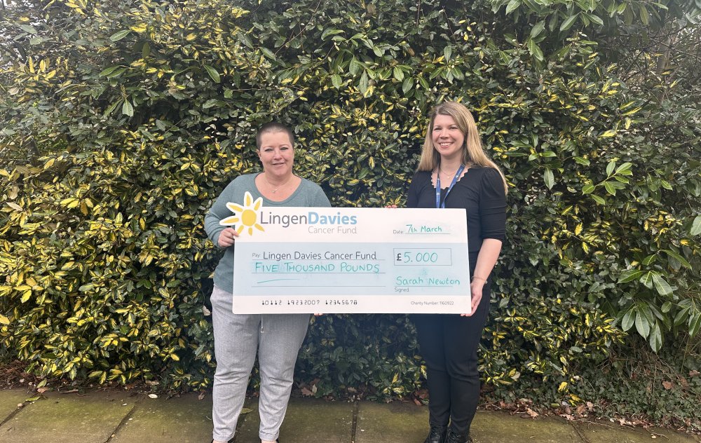 Sarah with her £5000 cheque